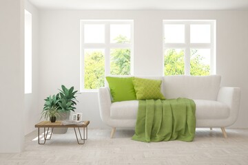 Fototapeta premium White living room with sofa and summer landscape in window. Scandinavian interior design. 3D illustration