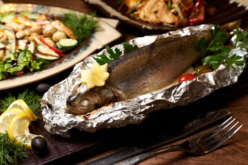 baked fish in foil with lemon and herbs