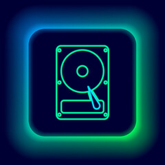 Glowing neon line Hard disk drive HDD icon isolated on black background. Colorful outline concept. Vector.