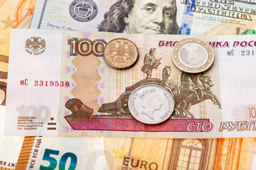 Dollars, euros, rubles and pounds lie on the surface