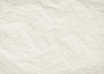 Beige crumpled sheet of kraft paper with texture