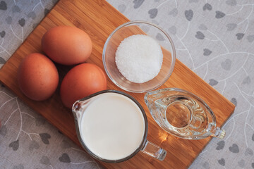 Ingredients for homemade pancakes. Cooking for someone special concept. Top view