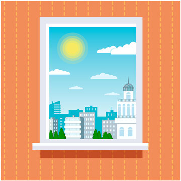 

A window from the room, from which you can see a sunny day with a cityscape with houses.