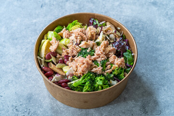 Healthy Food Bowl with Tuna Fish, Broccoli, Brussel Sprouts, Mexican Beans and Fusili Pasta. Buddha Bowl in Plastic Box Package Container.