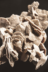 Desert rose crystal isolated on black background