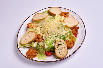 salad with cheese, shrimps, tomatoes, lettuce