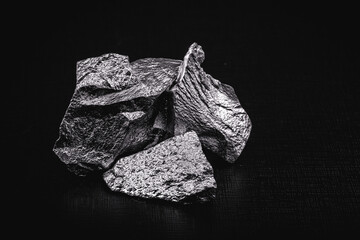 pure silicon stones isolated on black background - obrazy, fototapety, plakaty