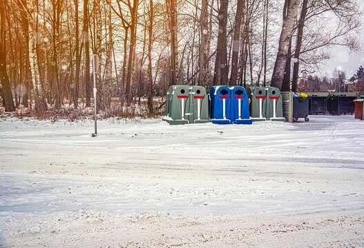 garbage bins in the woods outside the city