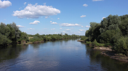 Landscape, beautiful wide river on a clear summer day.