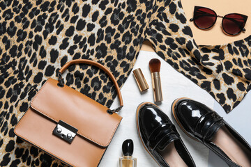 Stylish women's outfit on color background, flat lay