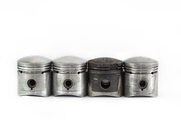 Pistons. One piston damaged by bad gasoline