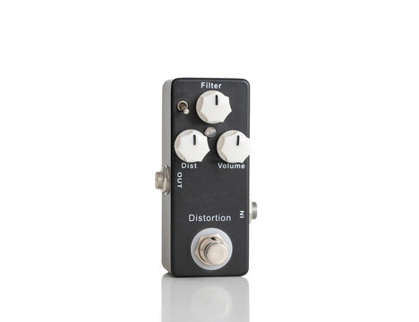 Black Distortion Guitar Pedal Isolated On White Background
