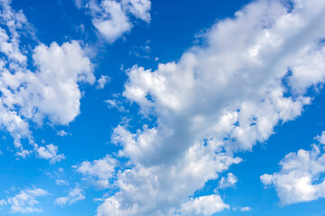Blue sky and white clouds. Summer background.