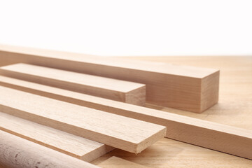 Group of assorted wood material like planks, squares, sheets. Timber for carpentry