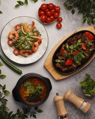 Restaurant menu. Salad with vegetables and meat. Beautiful salad serving