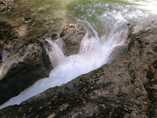 Naklejka premium Waterfall and cascades on Cajon del Rio Azul near the Argentine town of El Bolson