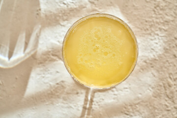 Top view of a probiotic drink in a glass