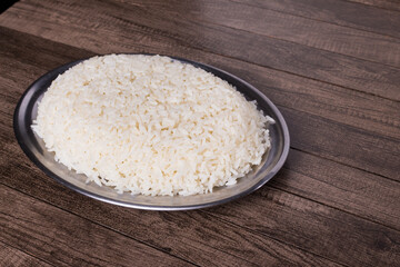 White rice in a tray. Gastronomic photograph of cooked white rice.