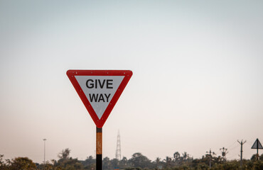 Indian road mandatory sign indicating to give way for the ongoing traffic. Sign indicating give way...