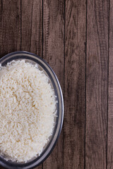 Cooked white rice. Vertical photograph with space for texts. Popular food.