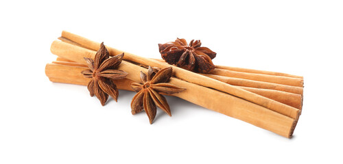 Aromatic cinnamon sticks and anise isolated on white