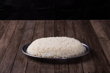 Portion of cooked white rice. Popular food from restaurants. Gourmet photography.
