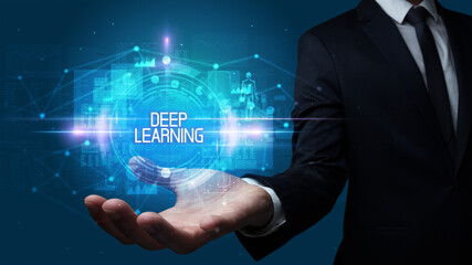 Naklejka premium Man hand holding DEEP LEARNING inscription, technology concept