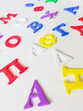 Colorful greek alphabet isolated on white background close up