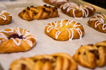 Fresh baked pastries on parchment paper