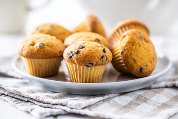 Vanilla muffins. Sweet cupcakes.