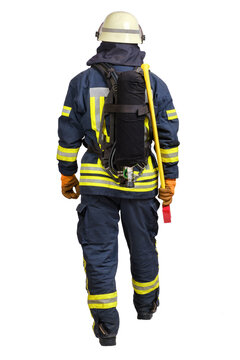 Rear view of full body walking firefighter in fire-proof uniform and hardhat with air tank on his back and axe isolated on white background isolated.