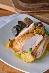 Chicken breast. Chicken pan seared to a crispy golden brown in brown butter and served with fresh organic vegetables: carrots, Brussels sprouts and green beans. Classic American restaurant favorite.