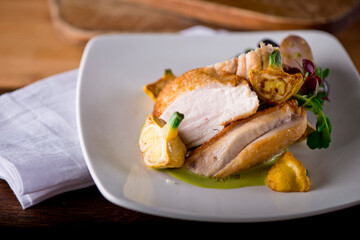 Chicken breast. Chicken pan seared to a crispy golden brown in brown butter and served with fresh organic vegetables: carrots, Brussels sprouts and green beans. Classic American restaurant favorite.