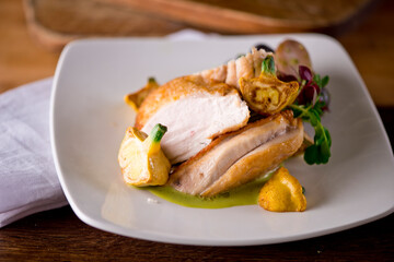 Chicken breast. Chicken pan seared to a crispy golden brown in brown butter and served with fresh organic vegetables: carrots, Brussels sprouts and green beans. Classic American restaurant favorite.