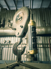 Steel chain hook chain hoist. industrial background. Crane load hook.