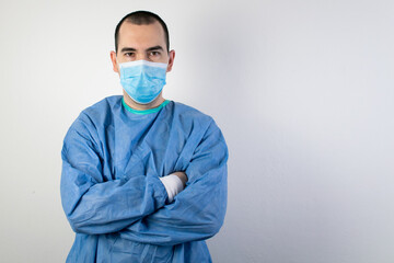 the main subject is out of focus, young male surgeon stand smile health care