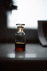 Vintage bottle with propolis tincture. Selective focus. Close up