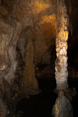 inside a cave walking around 
