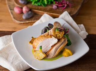 Chicken breast. Chicken pan seared to a crispy golden brown in brown butter and served with fresh organic vegetables: carrots, Brussels sprouts and green beans. Classic American restaurant favorite.