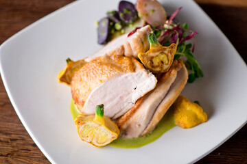 Chicken breast. Chicken pan seared to a crispy golden brown in brown butter and served with fresh organic vegetables: carrots, Brussels sprouts and green beans. Classic American restaurant favorite.