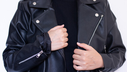 Wearing a black leather jacket  