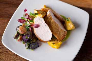 Chicken breast. Chicken pan seared to a crispy golden brown in brown butter and served with fresh organic vegetables: carrots, Brussels sprouts and green beans. Classic American restaurant favorite.