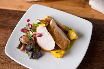 Chicken breast. Chicken pan seared to a crispy golden brown in brown butter and served with fresh organic vegetables: carrots, Brussels sprouts and green beans. Classic American restaurant favorite.
