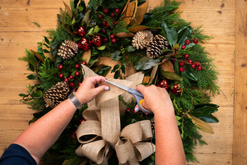 Instructional images on how to make a holiday wreath