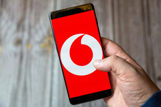 02-10-2021 Portsmouth, hampshire, UK A mobile phone or cell phone being held by a hand with the Vodafone app open on screen