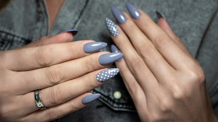 Nails Art Design. Hands With Manicure. Close Up Of Female Hands With Trendy Nails with decorations.