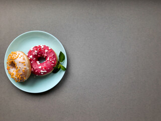Donuts and mint on a plate