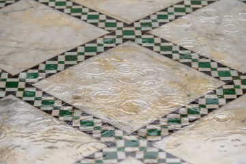 Colourful tiles and intricate plaster designs in Marrakesh Morocco