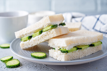 Cucumber cream cheese sandwiches on the plate