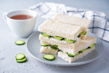 Cucumber cream cheese sandwiches on the plate
